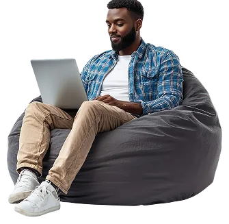 Developer working on a laptop on a bean bag
